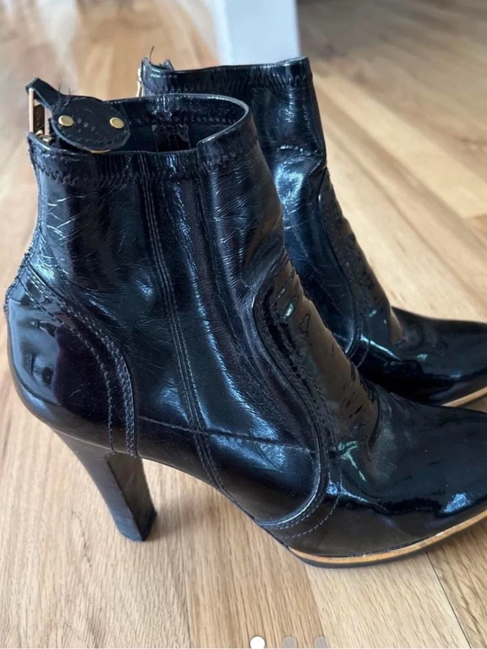 Tory Burch Black Patent Leather Ankle Booties with Gold Emblem